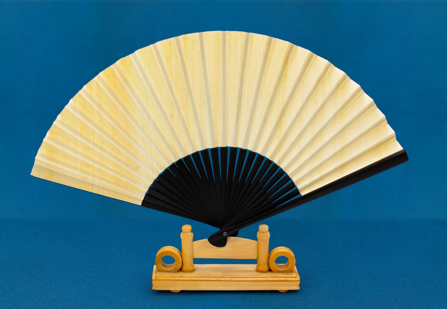 Natural wood folding fan