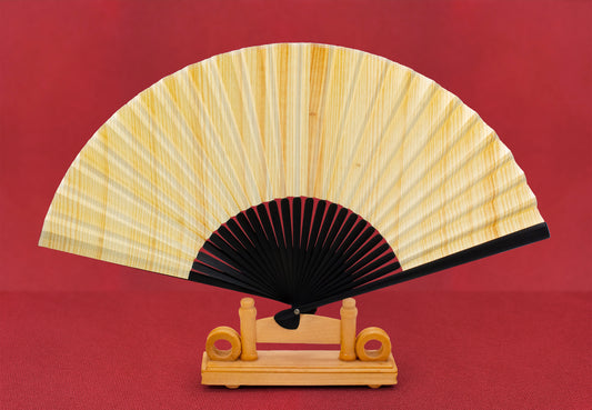 Natural wood folding fan