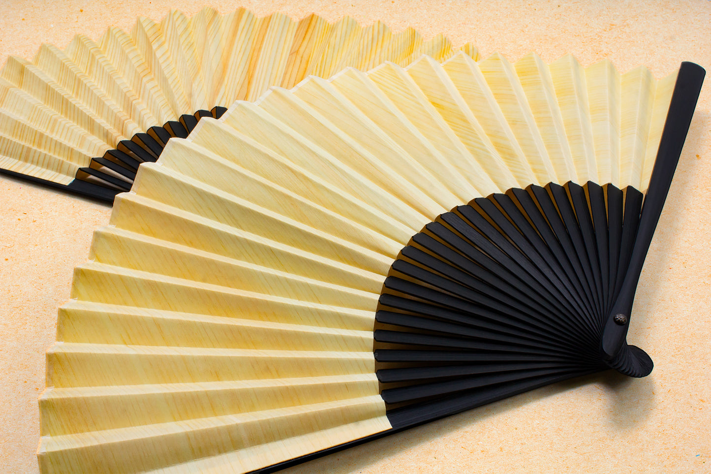 Natural wood folding fan